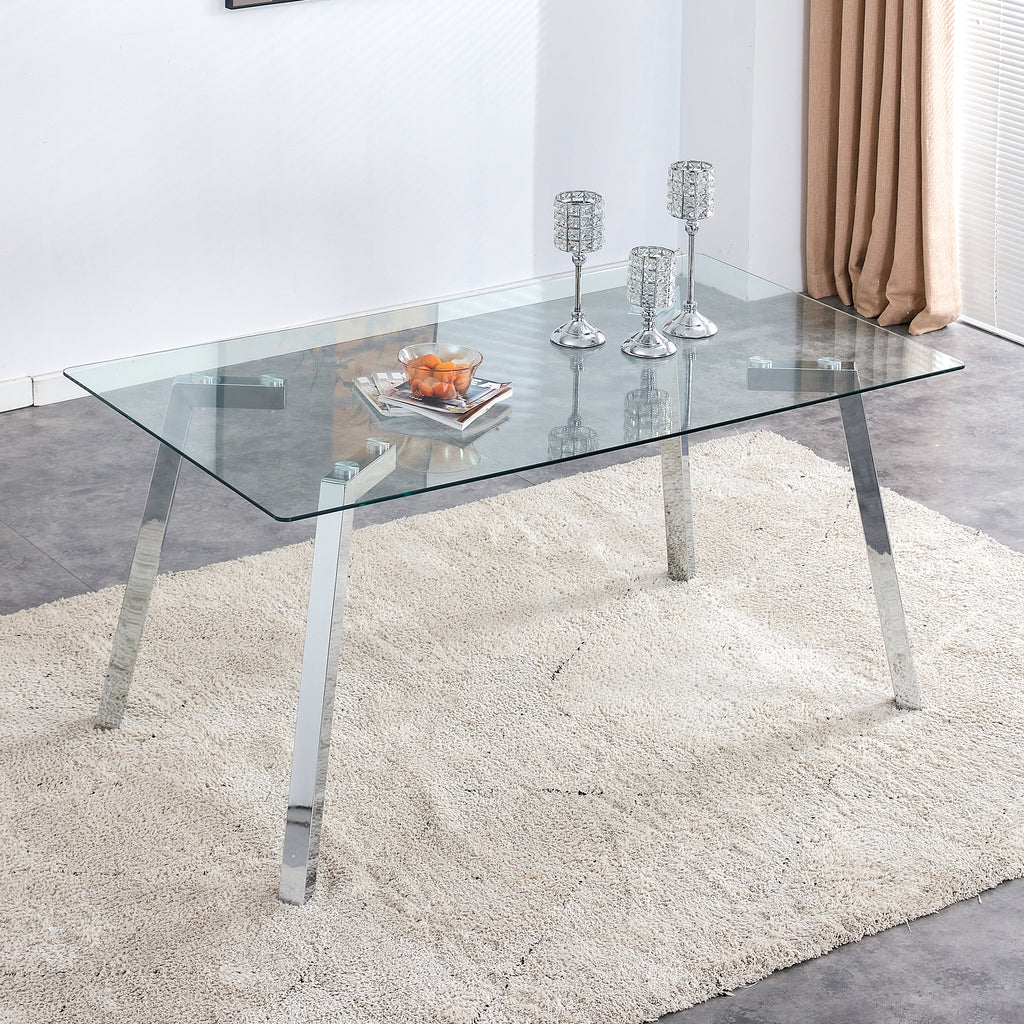 A modern minimalist rectangular glass dining table with tempered glass tabletop and silver metal legs, suitable for kitchens, restaurants, and living rooms,63'*35.4'*30'