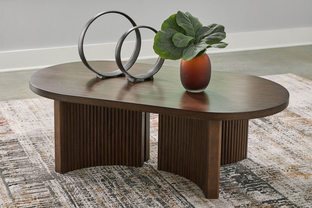 Korestone - Oval Cocktail Table - Dark Brown-1