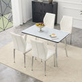 Table and chair set.White imitation marble texture glass top + lower black MDF board, silver metal tapered legs.Paired with 4 White PU Chairs with silver legs. 37 inches High: Ergonomic PU Backrest.