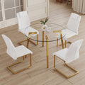 Table and chair set.A Modern Minimalist Style Round Clear Tempered Glass Table with Metal Legs.Paried with white chairs with Modern PU Leather High Back Upholstered and C-Tube Golden Legs.